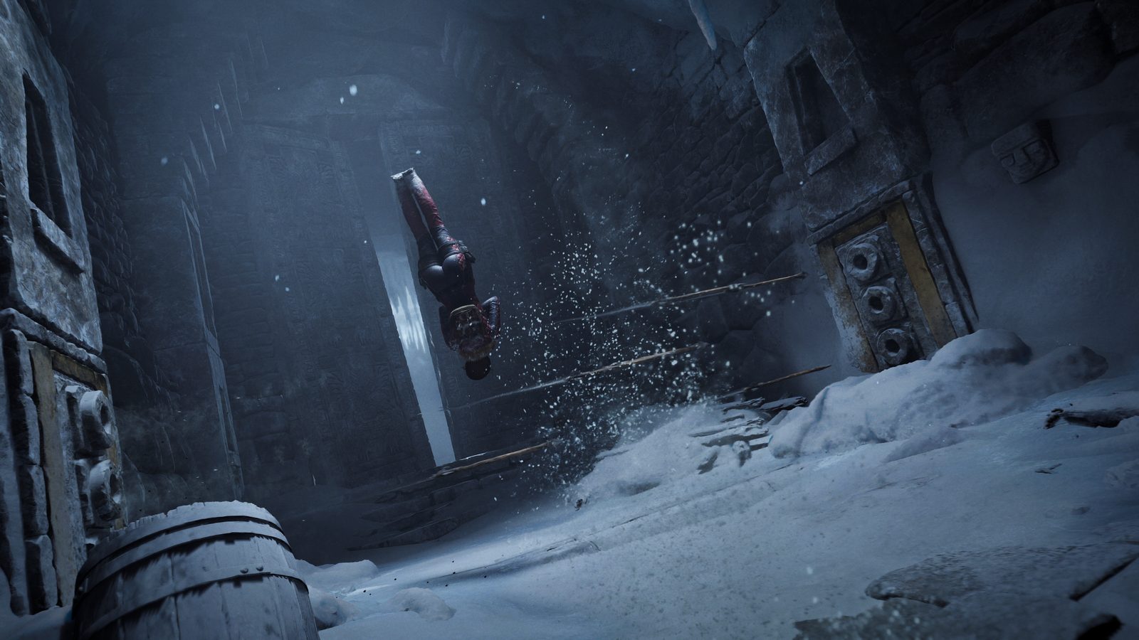 Lara Croft performing an acrobatic flip in mountain caves